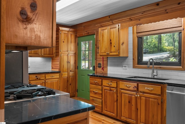 295 Sugarhill Rd, Seneca, SC 29672 - kitchen featuring a sink, stainless steel appliances, and brown cabinets