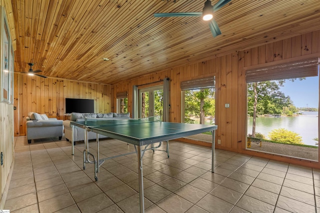 295 Sugarhill Rd, Seneca, SC 29672 - playroom with ceiling fan, tile patterned flooring, and wooden walls
