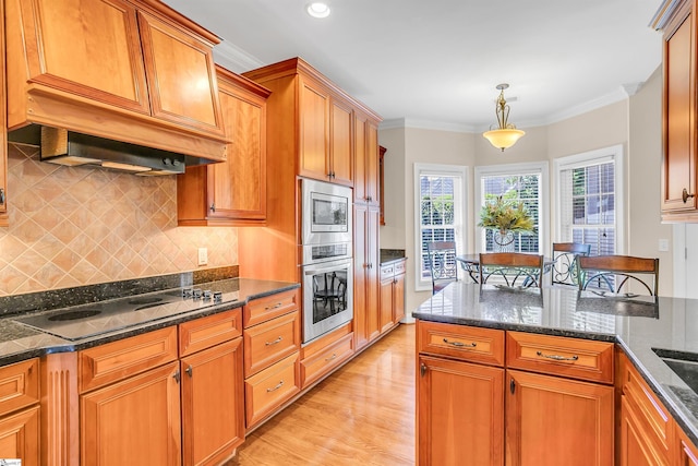 111 Tinsley Ct, Greenville, SC 29615 - kitchen featuring appliances with stainless steel finishes, custom exhaust hood, crown molding, light wood finished floors, and dark stone countertops