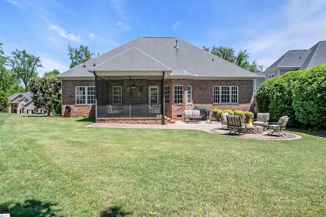 111 Tinsley Ct, Greenville, SC 29615 - rear view of property featuring a sunroom, a patio area, brick siding, and a lawn