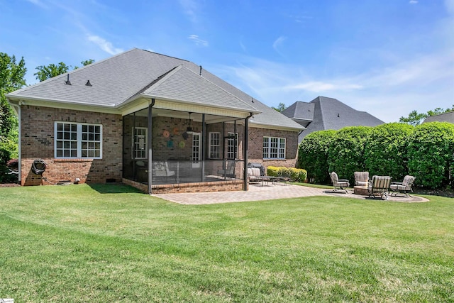 111 Tinsley Ct, Greenville, SC 29615 - rear view of property featuring a patio area, a sunroom, brick siding, and a lawn