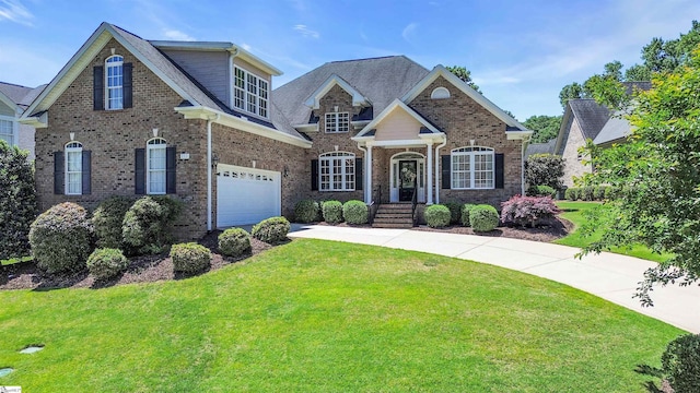 111 Tinsley Ct, Greenville, SC 29615 - craftsman-style home featuring driveway, a front lawn, brick siding, and an attached garage