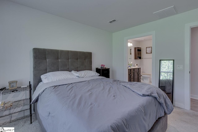 321 Aldworth Ln, Fountain Inn, SC 29644 - carpeted bedroom featuring baseboards and ensuite bathroom
