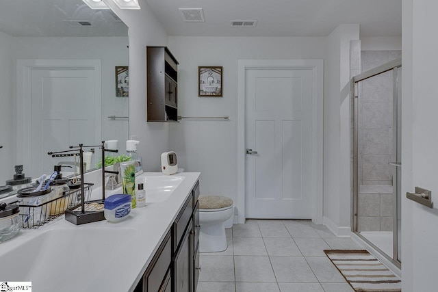 321 Aldworth Ln, Fountain Inn, SC 29644 - bathroom with a shower stall, tile patterned flooring, toilet, and double vanity