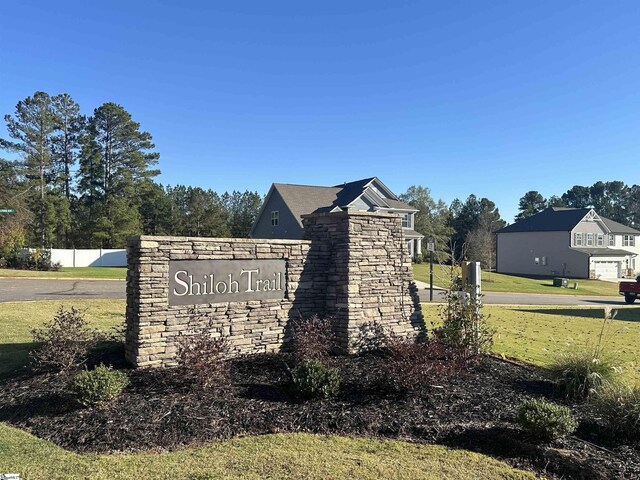 view of community sign