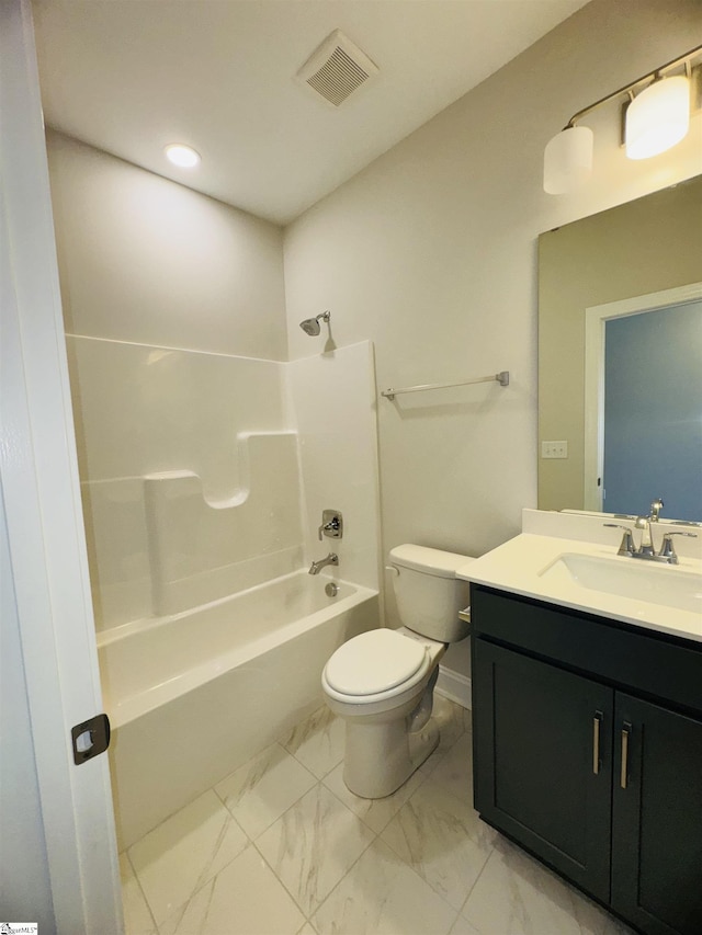 bathroom featuring marble look tile flooring, toilet, vanity, washtub / shower combination, and recessed lighting