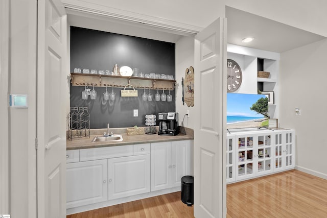 451 Cedar Creek Rd, Sunset, SC 29685 - indoor wet bar with light wood finished floors and baseboards