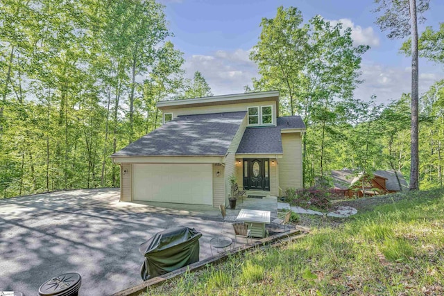 451 Cedar Creek Rd, Sunset, SC 29685 - mid-century inspired home with asphalt driveway, an attached garage, and roof with shingles
