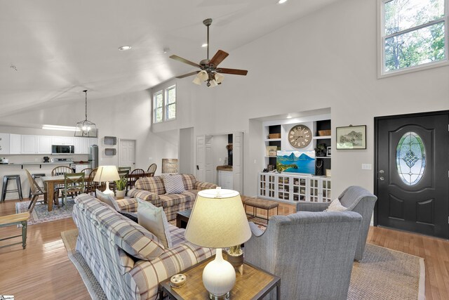 451 Cedar Creek Rd, Sunset, SC 29685 - living room featuring high vaulted ceiling, a ceiling fan, light wood finished floors, and recessed lighting