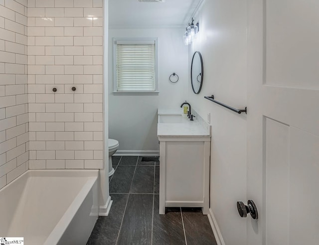 full bathroom featuring toilet, vanity, and baseboards