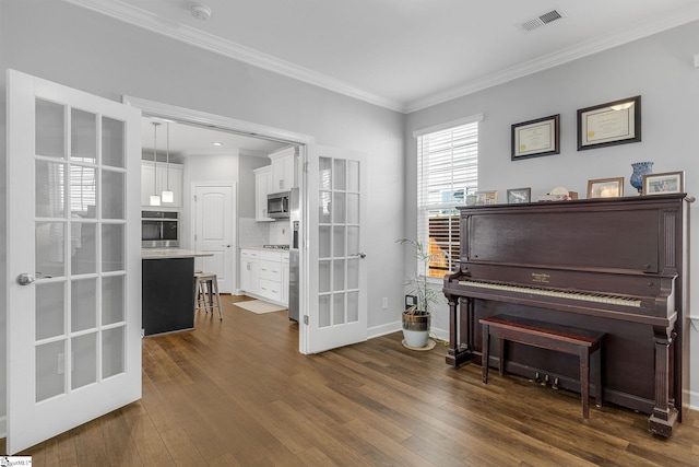 215 Sun Garden Ct, Greenville, SC 29615 - living area featuring french doors, crown molding, dark wood-style flooring, and baseboards