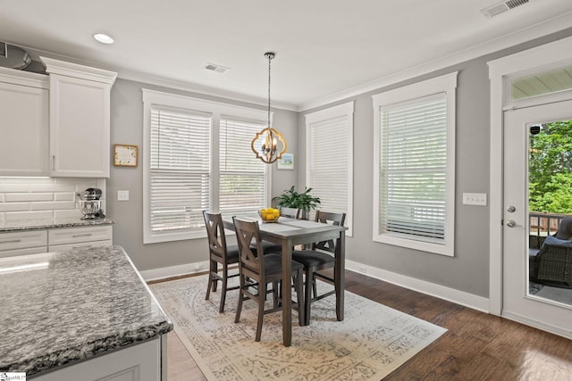 916 Lockhurst Dr, Simpsonville, SC 29681 - dining space featuring ornamental molding, baseboards, a chandelier, dark wood-style floors, and recessed lighting