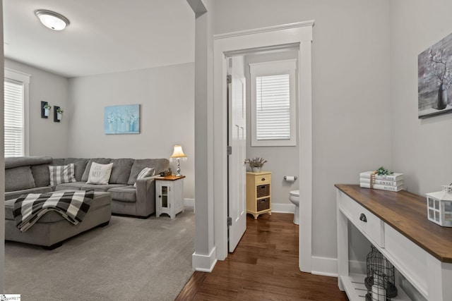 916 Lockhurst Dr, Simpsonville, SC 29681 - living area with dark wood-style flooring and baseboards