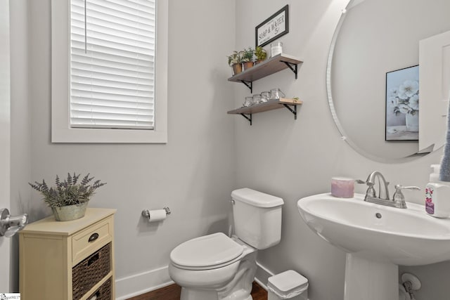916 Lockhurst Dr, Simpsonville, SC 29681 - bathroom featuring toilet, baseboards, a sink, and wood finished floors