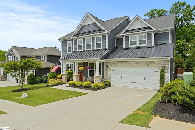 916 Lockhurst Dr, Simpsonville, SC 29681 - craftsman inspired home featuring a standing seam roof, metal roof, driveway, a shingled roof, and stone siding