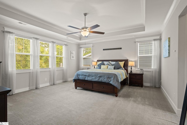 916 Lockhurst Dr, Simpsonville, SC 29681 - carpeted bedroom featuring a tray ceiling, baseboards, crown molding, and ceiling fan