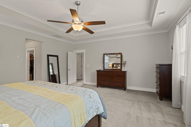 916 Lockhurst Dr, Simpsonville, SC 29681 - bedroom with a tray ceiling, light carpet, ornamental molding, a ceiling fan, and baseboards