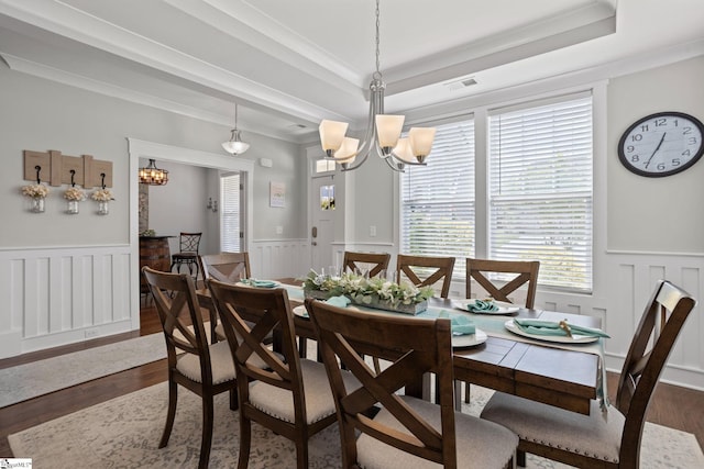 916 Lockhurst Dr, Simpsonville, SC 29681 - dining room with a chandelier, dark wood finished floors, a wainscoted wall, ornamental molding, and a decorative wall