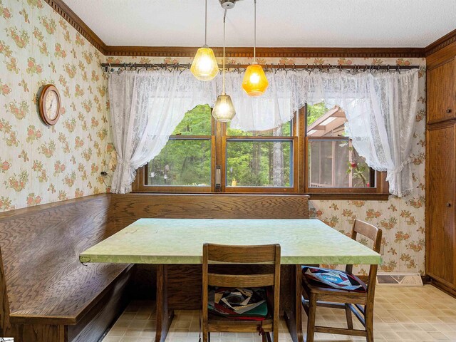 132 Rosecrest Rd, Spartanburg, SC 29303 - dining room with wallpapered walls, healthy amount of natural light, baseboards, and a textured ceiling