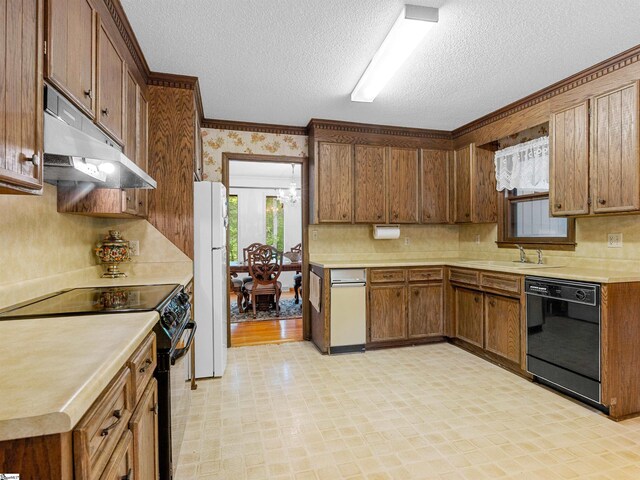 132 Rosecrest Rd, Spartanburg, SC 29303 - kitchen with black appliances, under cabinet range hood, light floors, a textured ceiling, and a sink