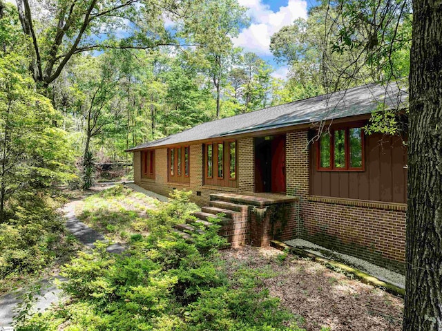 132 Rosecrest Rd, Spartanburg, SC 29303 - view of side of home featuring brick siding and board and batten siding