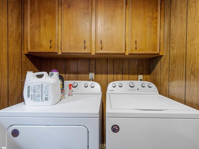 132 Rosecrest Rd, Spartanburg, SC 29303 - laundry room with separate washer and dryer, cabinet space, and wooden walls