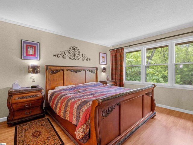 132 Rosecrest Rd, Spartanburg, SC 29303 - bedroom with multiple windows, light wood finished floors, baseboards, and ornamental molding