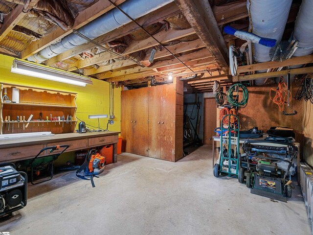 132 Rosecrest Rd, Spartanburg, SC 29303 - unfinished basement featuring a workshop area