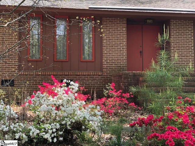 132 Rosecrest Rd, Spartanburg, SC 29303 - property entrance featuring brick siding