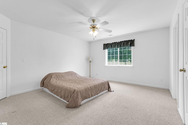 477 Perry Rd, Greer, SC 29651 - carpeted bedroom featuring baseboards and a ceiling fan