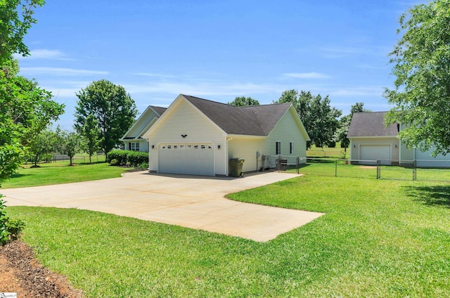 477 Perry Rd, Greer, SC 29651 - view of side of home featuring an attached garage and driveway