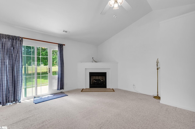 477 Perry Rd, Greer, SC 29651 - unfurnished living room with carpet floors, vaulted ceiling, a fireplace with flush hearth, and ceiling fan