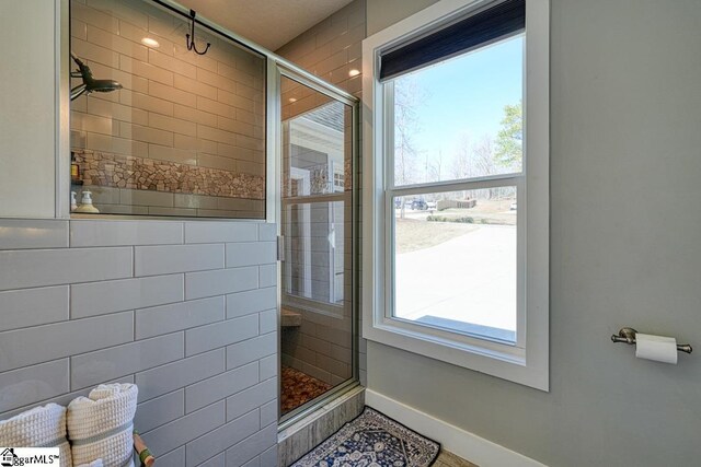 2007 Edwards Lake Rd, Greer, SC 29651 - full bathroom with tiled shower and baseboards