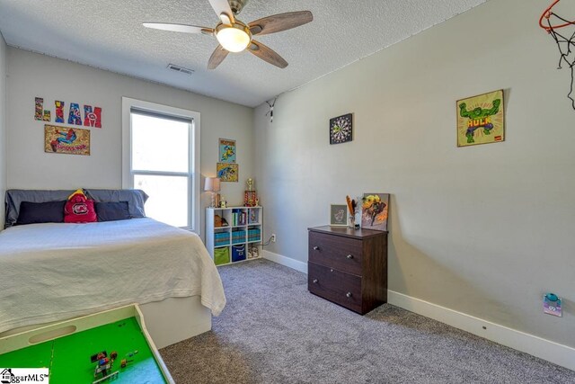 2007 Edwards Lake Rd, Greer, SC 29651 - bedroom with a textured ceiling, carpet, a ceiling fan, and baseboards