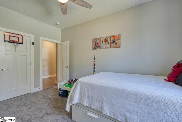 2007 Edwards Lake Rd, Greer, SC 29651 - carpeted bedroom with ceiling fan and a textured ceiling