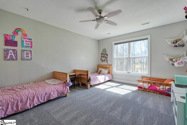 2007 Edwards Lake Rd, Greer, SC 29651 - bedroom with carpet, a textured ceiling, and ceiling fan