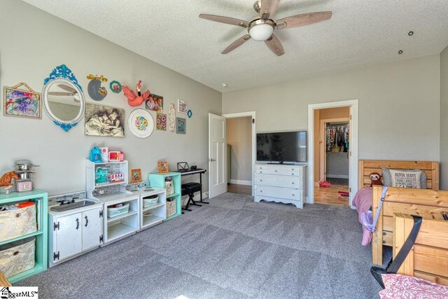 2007 Edwards Lake Rd, Greer, SC 29651 - playroom featuring ceiling fan, carpet flooring, and a textured ceiling