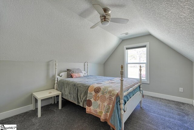 2007 Edwards Lake Rd, Greer, SC 29651 - bedroom with a textured ceiling, ceiling fan, lofted ceiling, baseboards, and carpet flooring