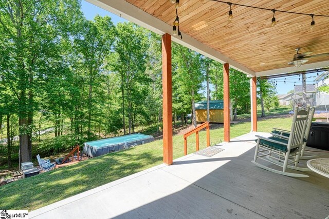 2007 Edwards Lake Rd, Greer, SC 29651 - view of patio / terrace featuring a swimming pool, a ceiling fan, and a hot tub