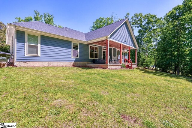 2007 Edwards Lake Rd, Greer, SC 29651 - view of front of home with a front yard, a shingled roof, and a porch