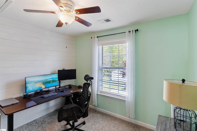 office area featuring baseboards, ceiling fan, and carpet floors
