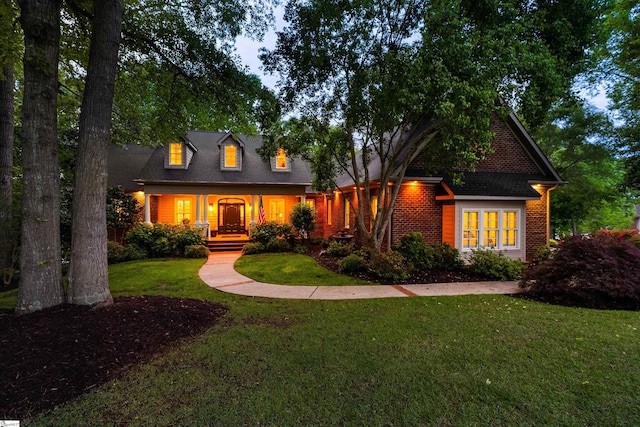 201 King Eider Way, Taylors, SC 29687 - new england style home with a front yard and a porch