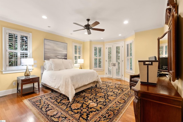 201 King Eider Way, Taylors, SC 29687 - bedroom with access to exterior, wood finished floors, recessed lighting, baseboards, and crown molding