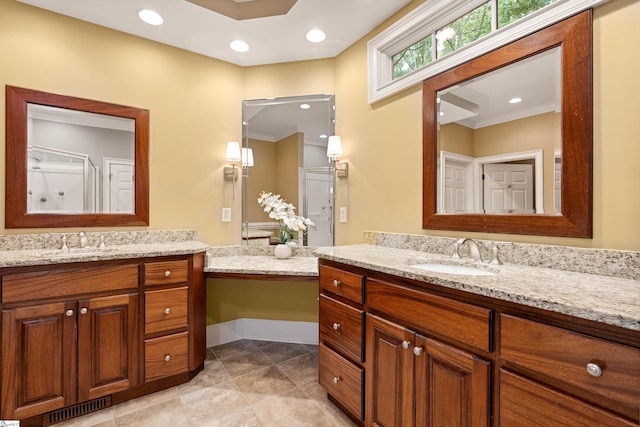 201 King Eider Way, Taylors, SC 29687 - full bathroom featuring two vanities, tile patterned floors, a shower, and crown molding