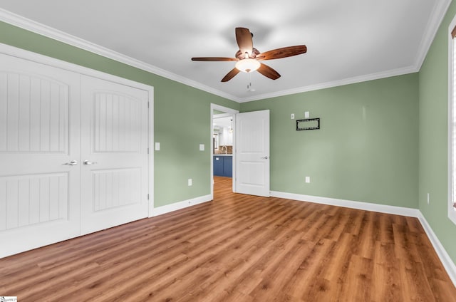 130 Windjammer Way, Anderson, SC 29626 - unfurnished bedroom featuring baseboards, light wood-type flooring, a closet, ornamental molding, and ceiling fan