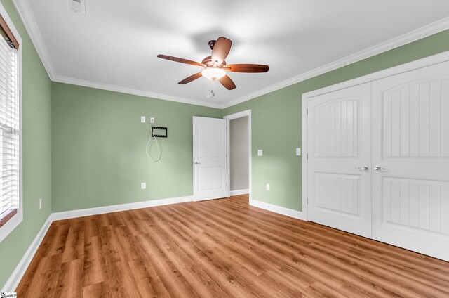 130 Windjammer Way, Anderson, SC 29626 - unfurnished bedroom with light wood-type flooring, baseboards, ornamental molding, a closet, and a ceiling fan