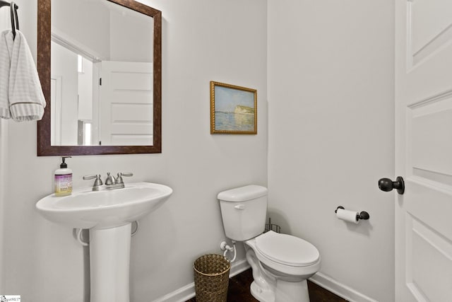 706 Airdale Ln, Simpsonville, SC 29680 - bathroom with baseboards, toilet, and a sink