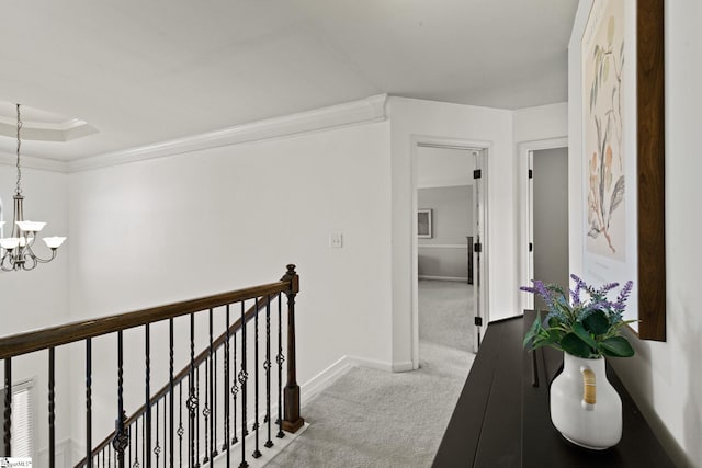 706 Airdale Ln, Simpsonville, SC 29680 - hall featuring carpet, ornamental molding, an upstairs landing, a chandelier, and baseboards