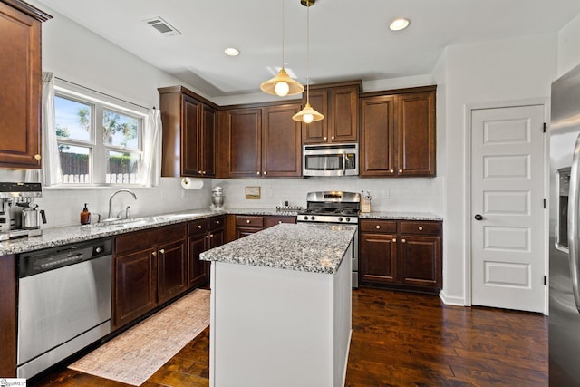 706 Airdale Ln, Simpsonville, SC 29680 - kitchen featuring stainless steel appliances, a sink, backsplash, light stone counters, and recessed lighting