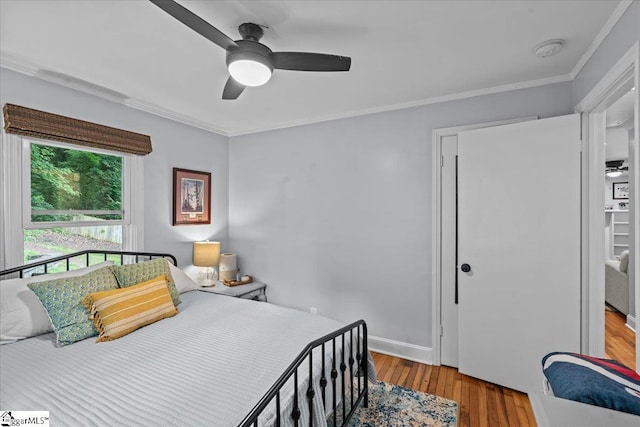 11 Christopher St, Greenville, SC 29617 - bedroom with crown molding, wood finished floors, ceiling fan, and baseboards